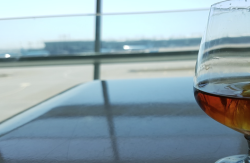 a glass of wine on a table