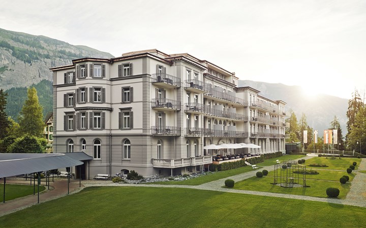 a building with a lawn and a playground