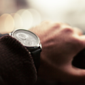 a close up of a watch on a wrist