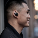 a man wearing a wireless earbud