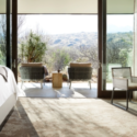 a bedroom with a view of the mountains