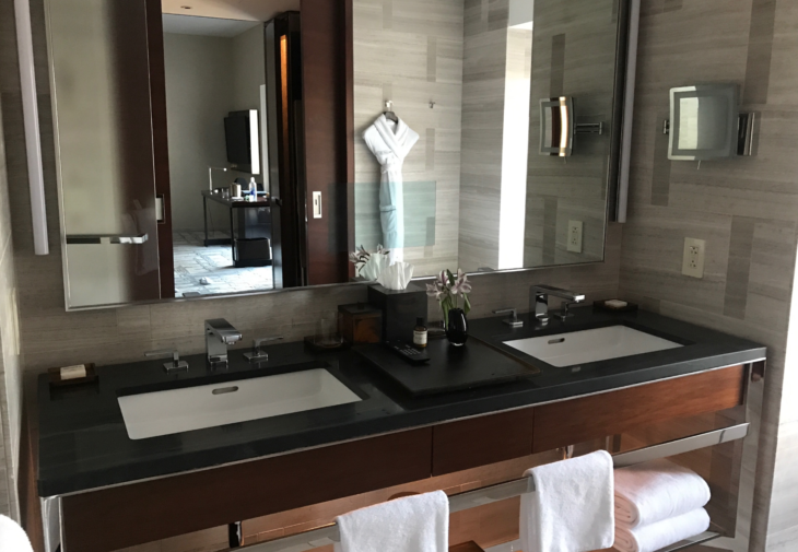 a bathroom with a mirror and two sinks