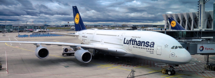 a large white airplane parked on a tarmac