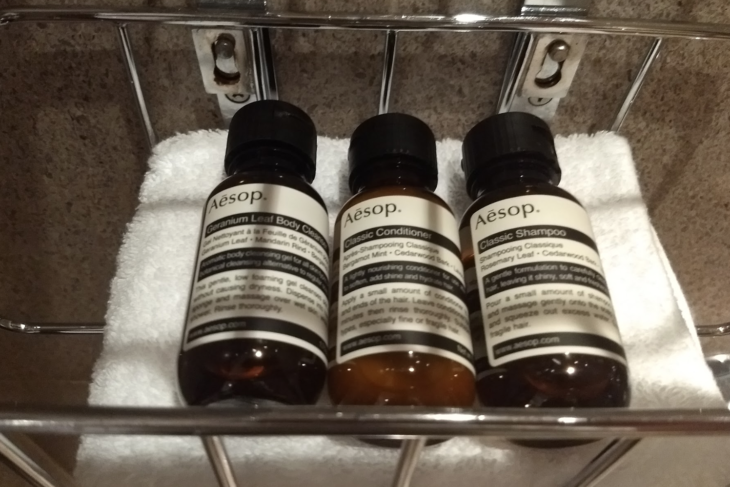 a group of small bottles on a towel