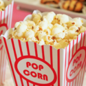 a close up of popcorn in a box