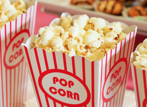 a close up of popcorn in a box