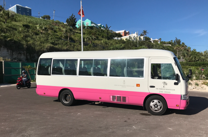 a white and pink bus