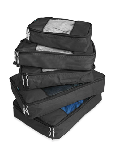 a stack of black luggage