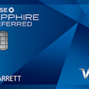 a blue credit card with silver text and a symbol