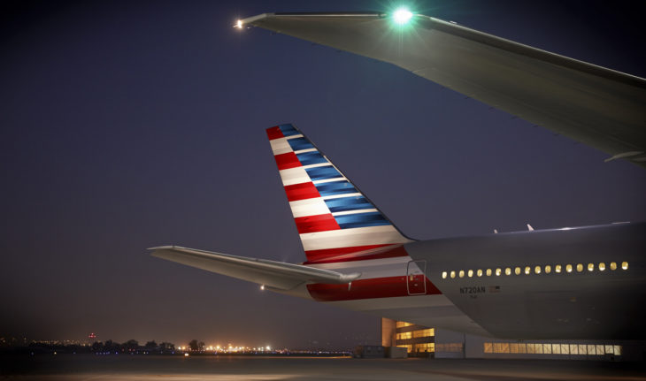 the tail of an airplane at night