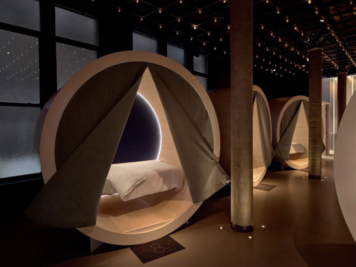a group of beds in a room