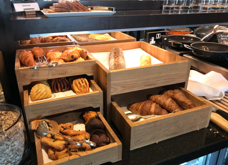 a group of wooden boxes with food in them