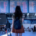 a woman looking at a screen with text