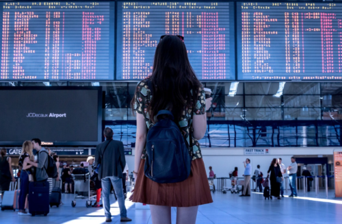 a woman looking at a screen with text