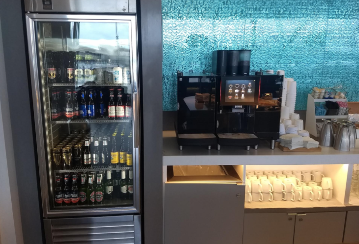 a display case with drinks on it