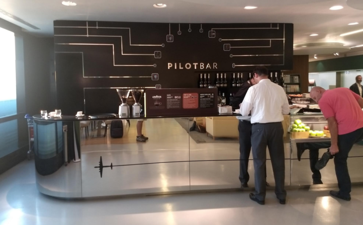 a man standing next to a counter