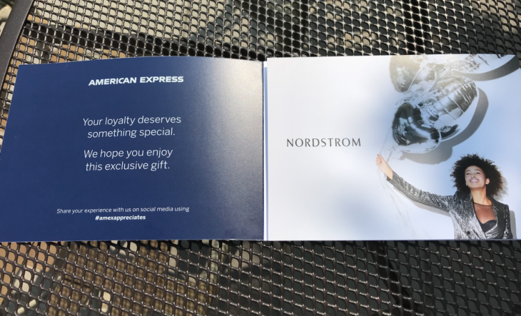 a blue and white card with a picture of a person on it