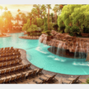 a pool with a waterfall and chairs