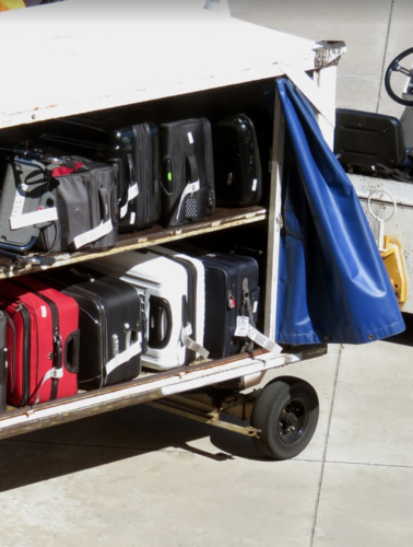 luggage on a cart with luggage