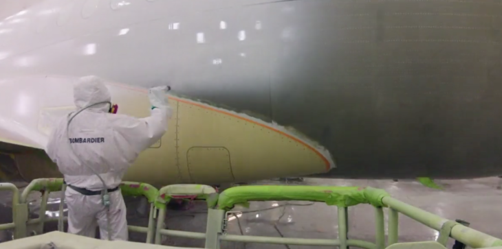 a person painting a plane