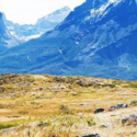 a mountain range with snow capped mountains