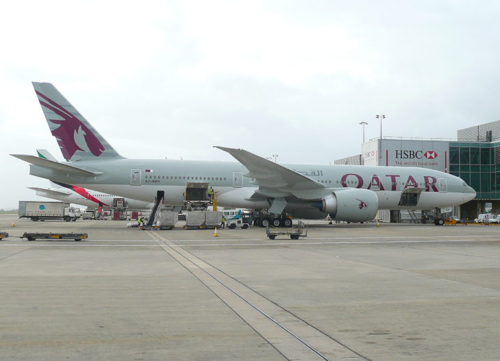 a large white airplane parked on a tarmac