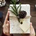 a person holding a gift box