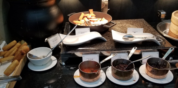 a buffet table with food on plates