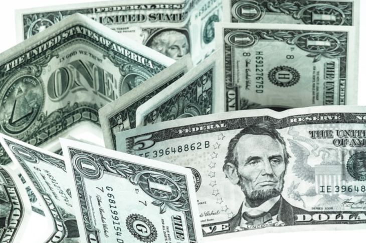 a close-up of several dollar bills