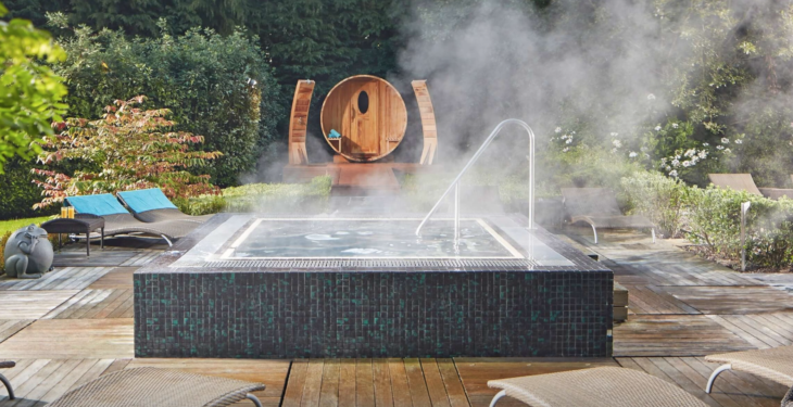 a hot tub with steam coming out of it