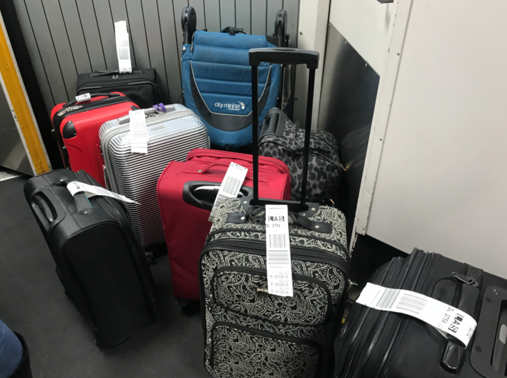 a group of luggage in a room