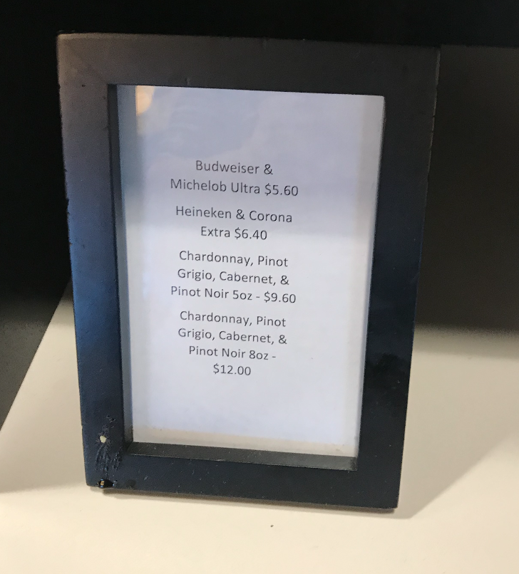 a menu sign on a table