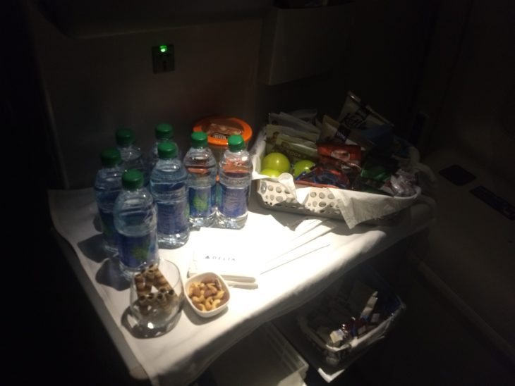 a table with food and water bottles