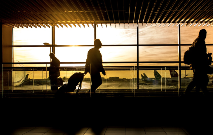 people walking in an airport