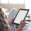 a person holding a tablet