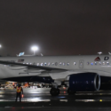 a plane on the runway at night