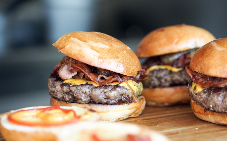 a close up of a burger