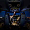 people in the cockpit of an airplane