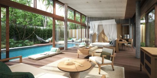 a room with a pool and a couch