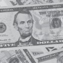 a close-up of a few dollar bills