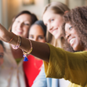 a group of women smiling