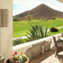 a view of a golf course from a patio