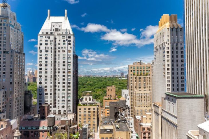 a group of tall buildings in a city