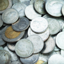 a pile of coins with images on them
