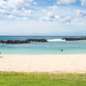 a beach with rocks and water