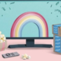 a computer screen with a rainbow and a box of popcorn