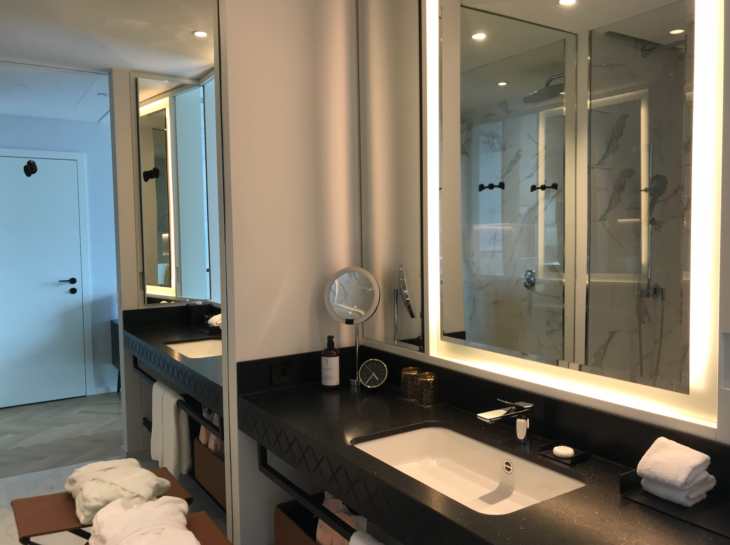 a bathroom with a mirror and sink