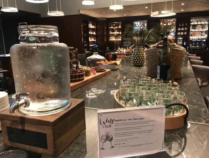 a counter with a glass jar and glasses