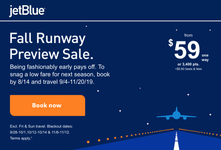 a blue advertisement with an airplane on the runway