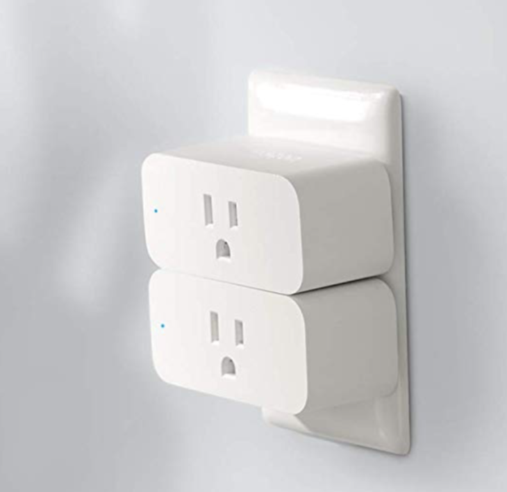 a white electrical outlet on a wall